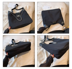 Detailed views of a black nylon tote bag featuring bold silver chain and metal buckle accents