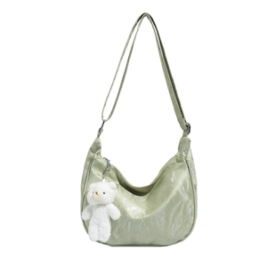 Pale green crescent shoulder bag with marble texture and cute teddy bear charm