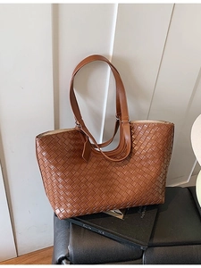 Brown woven leather tote bag for women with Intrecciato craftsmanship for daily commute