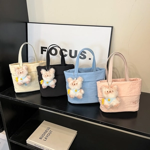 Sacs seau légers en tissu Oxford en quatre couleurs pastel avec breloque ours