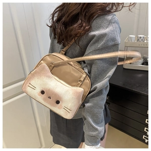 Chic beige PU leather crossbody bag featuring a 3D plush cat face pocket detail