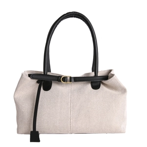 Vintage canvas tote bag with black leather handles and golden metal buckle details