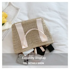 Capacity display of straw woven bag holding smartphone and makeup accessories
