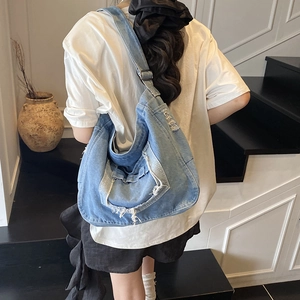 Casual large capacity denim hobo bag with fringe detail for daily commute and students