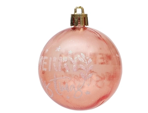 Detalle de bola navideña rosa de 6cm con texto de purpurina y adorno festivo brillante