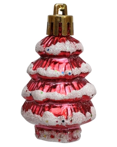 Detalle de adorno de árbol de Navidad rojo con nieve brillante y un capuchón dorado