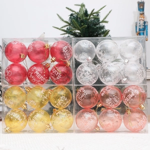 Set de 24 bolas de Navidad de PET transparente con estampados de Feliz Navidad y copos