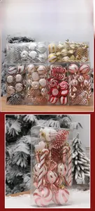 Close-up of assorted red and white Christmas ornaments set in a clear display box