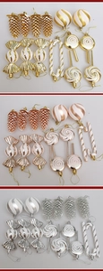 Detailed set of festive Christmas ornaments including pinecones, candies, and candy canes