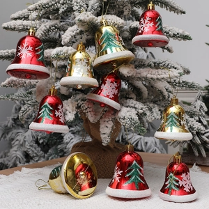 Christmas painted bell ornaments with red hat design and snowflake patterns for tree decor