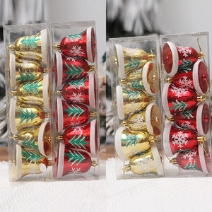 6-piece Christmas bell ornaments set in red and gold with snowflake patterns and snow tops