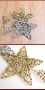 Detailed close-up of iron Christmas tree topper with glitter finish and spiral base