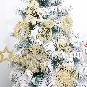 Set de adornos navideños dorados con purpurina incluyendo estrella, reno y ángel para árbol