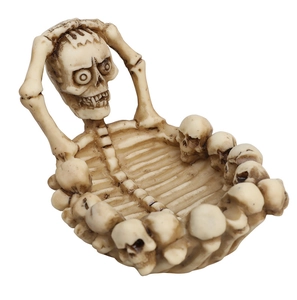 Detail view of gothic skull resin tray showing intricate bone textures and vintage finish