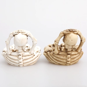 Gothic skull ashtray and skeleton tabletop tray in white and vintage yellow finishes