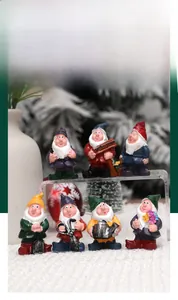 Detailed view of seven colorful resin garden gnomes set for Christmas decorations