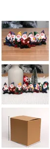 Detailed view of 7 miniature resin garden gnomes with colorful tools and welcome sign