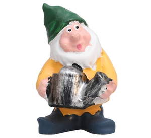 Close-up of resin garden dwarf figurine wearing a green hat and holding a silver watering can