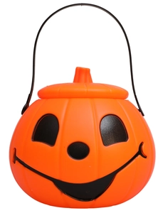Close-up of Halloween Jack-o'-lantern candy bucket with black handle and classic smile