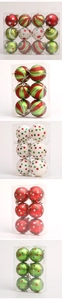Close-up of red and green striped Christmas balls with glitter polka dots in packaging