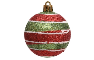 Detailed view of red and green sequined Christmas ball with white snowflake patterns