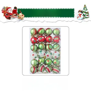 Detailed view of 24pcs red and green painted Christmas balls with various textures