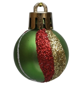 Detailed view of a green Christmas ornament with red and gold glitter wave patterns