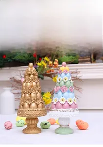 Detail of floral resin cone trees with rose relief and daisy patterns for Easter decor