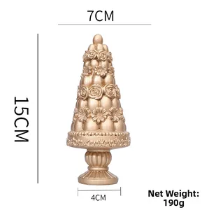 Detailed dimensions of a gold embossed resin tree ornament with floral patterns