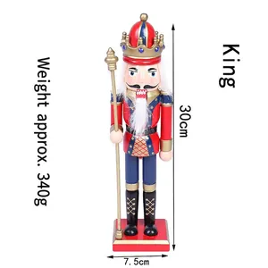 Traditional 30cm wooden Nutcracker King figure in red and gold with 7.5cm base