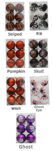 Detail view of 6-piece Halloween baubles set showing pumpkin and ghost painted patterns