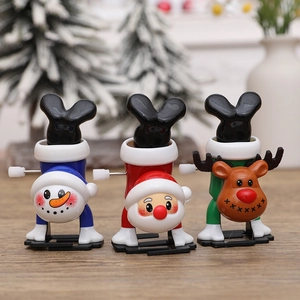 Wind-up Christmas toys set featuring Santa, Reindeer and Snowman in handstand poses