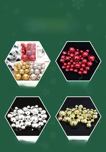 Close-up of faceted Christmas balls in red, gold, and silver with metallic finish
