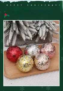 Detail of 6cm Christmas ornaments with star patterns in red, gold and silver