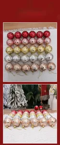 Detail of hollow star pattern Christmas ornaments in red gold silver and pink finish