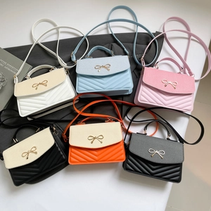 Minimalist crossbody bag set in six colors with chevron stitching and bow detail