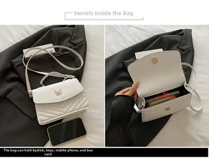 Detail of white quilted crossbody bag showing interior capacity for phone and lipstick