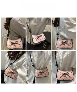 Six views of a pink shoulder bag with large black bow and heart pendant on a model