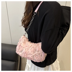 Detail of light pink 3D mesh floral shoulder bag with silver chain and leather strap