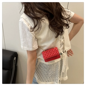 Model view showing the red quilted crossbody bag with golden chain strap for women