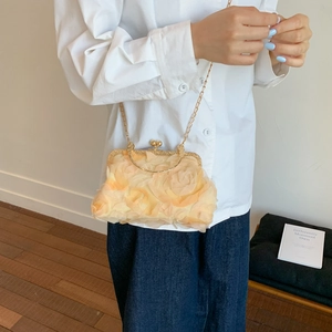 Elegant orange floral crossbody bag with gold chain and 3D rose petals for summer