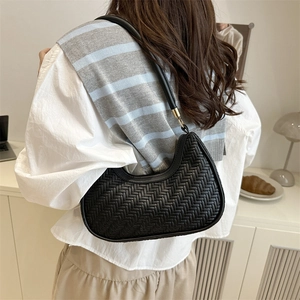 Fashionable black woven hobo underarm bag with thin shoulder strap for women's daily commute