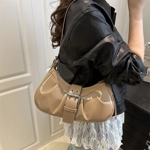 Vintage pleated patent leather shoulder bag with metallic buckle in y2k aesthetic