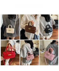Detailed views of mini faux-croco handbags in six colors with metallic swivel lock and strap