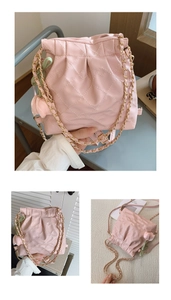 Detailed view of pink quilted drawstring bag with 3D tulip pendant and gold chain strap