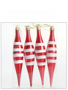 Set of four red and white striped spindle-shaped Christmas tree ornaments in clear box