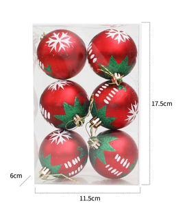Détails de boules de Noël rouges de 6cm avec motifs flocons dans leur boîte d'emballage