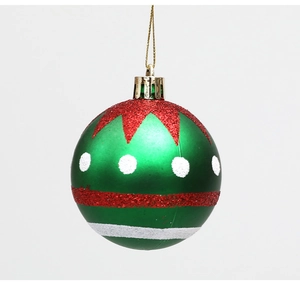 Détail de boule de Noël verte 6cm avec zigzags pailletés rouges et pois givrés blancs