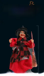 Detail view of 18cm Halloween witch doll with red checkered cape and wooden broomstick