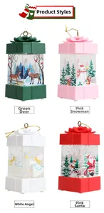 Detail of four colorful Christmas lantern gift boxes with festive patterns and bow knots